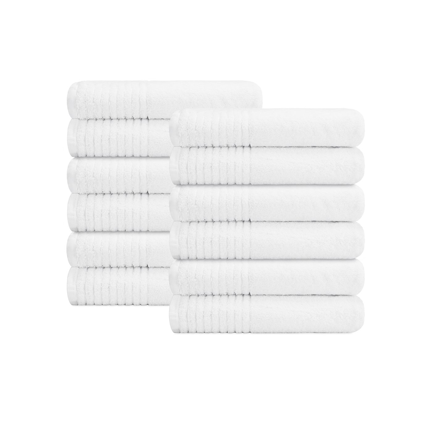 Folded stacks of hotel-grade white bath towels